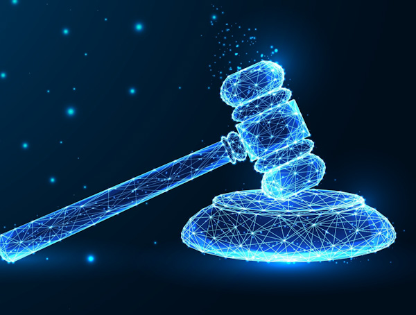 Justice, law, court concept with judge gavel in futuristic glowing low polygonal style on dark blue
